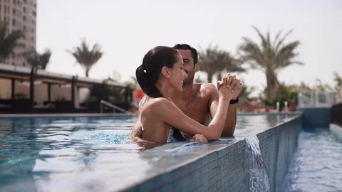 Romantic couple at poolside. Stock Footage 119509270
