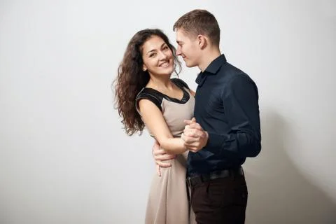 Romantic couple posing on white background Foto stock
