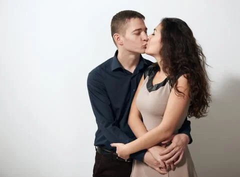 Romantic couple posing on white background, love concept Stock Photos
