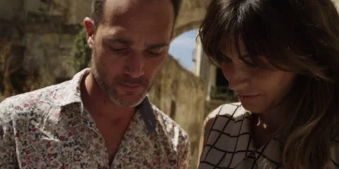 Romantic couple reading a map Video stock 58861075