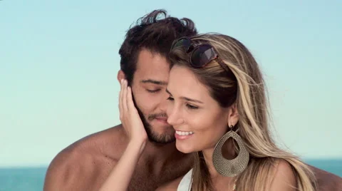 Romantic couple relaxing and having skewered fruits on beach Stock Footage 59441824