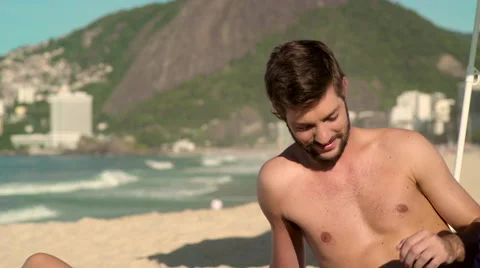 Romantic couple relaxing on Ipanema beach Stock-Footage 59374839