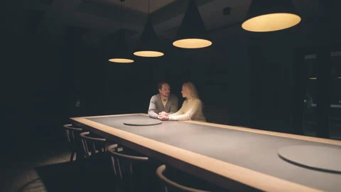 The romantic couple sitting at the night empty bar. slow motion Stock Footage 168701131