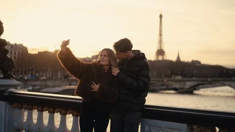 Romantic Couple Taking Selfie With Eiffel Tower In Paris France At Sunset T.. Stock Photos