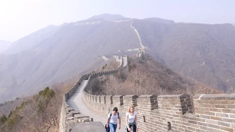 Romantic couple walk on Great Wall of China Stock Footage 99585705