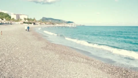 Romantic couple walking on beach Stock Footage 167361893