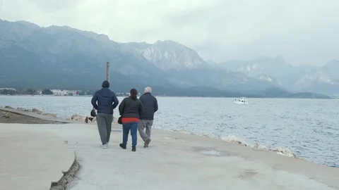 Romantic couple walking on beach Stock Footage 167372150