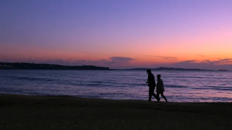 Romantic couple walking on the beach at sunset - Sanary Sur Mer France - HD 4K+ Stock Footage 45973954