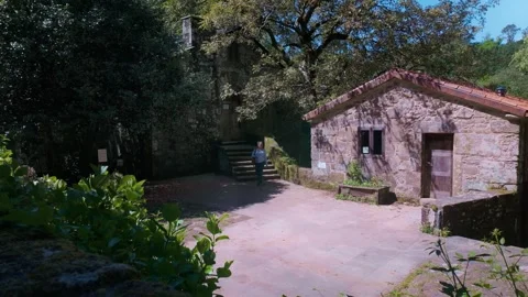 Romantic couple walking together on an old stone path Видео 333749191