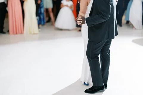Romantic dance celebration. Shared romantic waltz illuminated by gentle 스톡 사진