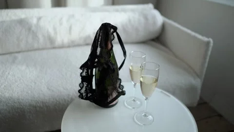Romantic date of a couple with two glasses of champagne, romance and love. The Stock Footage 264689090