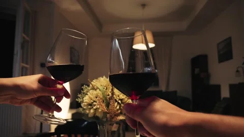 Romantic date dinner, couple drinking wine and making cheers with glasses during Stock Footage 326484619