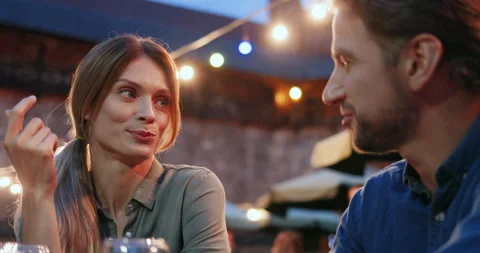 Romantic date in the evening with wine of two good looking woman and man Stock Footage 139505880