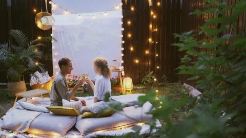 Romantic dating on decorated backyard Video stock 253280308
