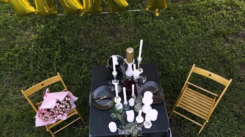 Romantic decor elements for marriage requests. Romantic outdoor dinner. Stock Footage 148647803