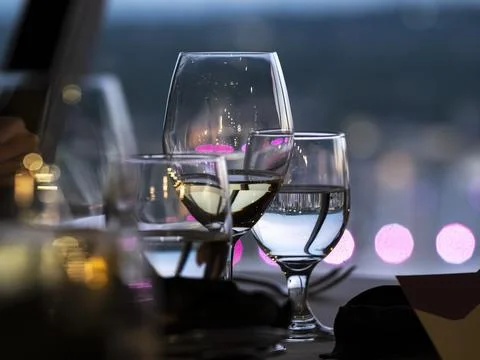 Romantic Dining Table with Wine Glasses Stock Photos