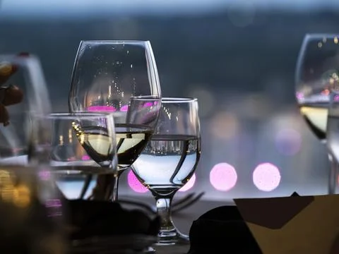Romantic Dining Table with Wine Glasses Stock Photos