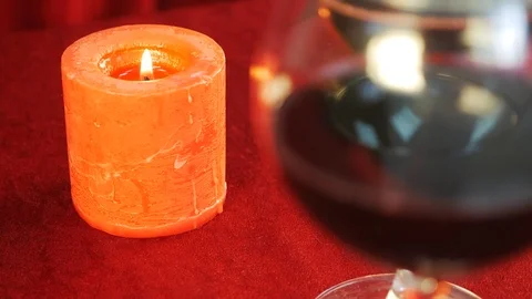 Romantic dinner. Candle and wine glass Stock Footage 89258802
