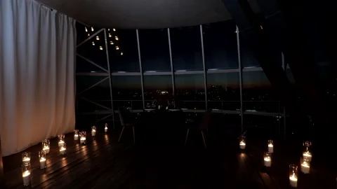 Romantic dinner in a candlelit restaurant Stock Footage 234180839