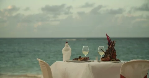 Romantic Dinner &amp; Champagne on Windy Beach, Cinematic 4K Slow Motion Stock Footage 112457549