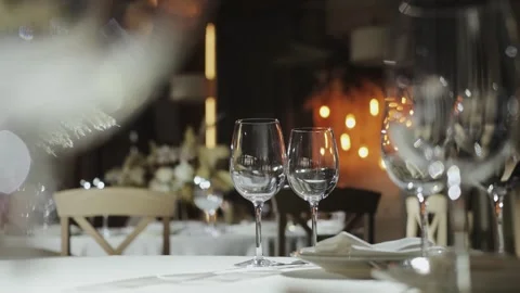 A romantic dinner in an elegant restaurant with candlelight and wine Stock Footage 306361523