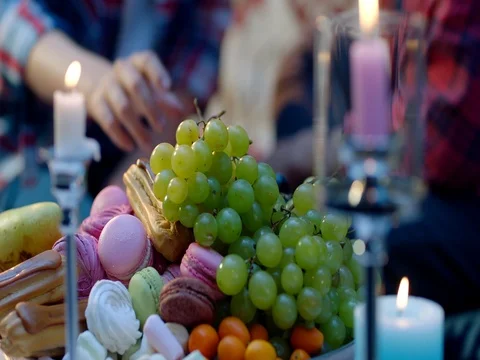 Romantic dinner, grapes of sweets and candles Video stock 83276377