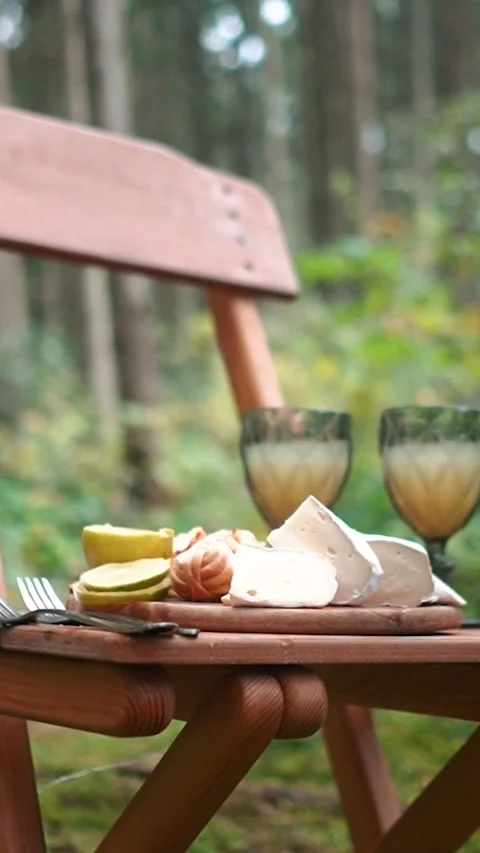 A romantic dinner outdoors, in the forest, or in the mountains Stock-Footage 331160510