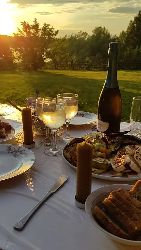 Romantic dinner outdoors on sunset. Stock Footage 269185317