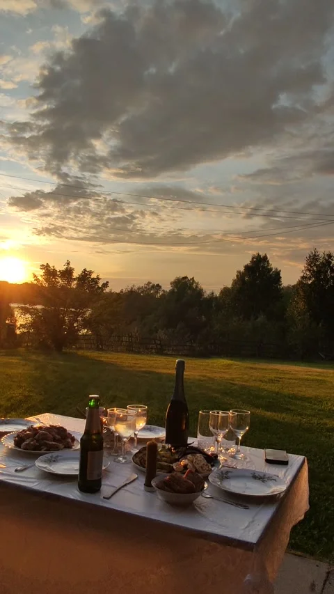 Romantic dinner outdoors on sunset. Stock Footage 269185528