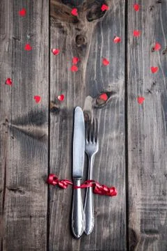 Romantic dinner set on wooden background Stock Photos