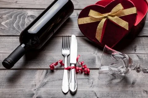 Romantic dinner set on wooden background Stock Photos