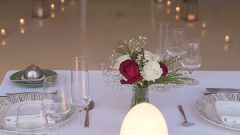 Romantic dinner table couple rose Stock Footage 144588010