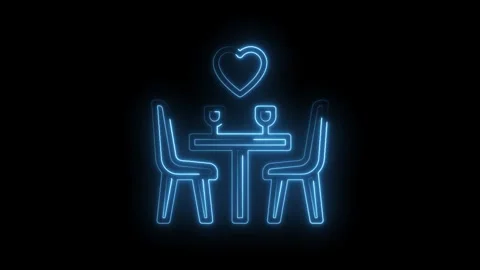 Romantic dinner table with glowing neon heart icon for valentines day design Stock Footage 322984110