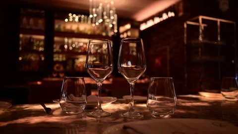 Romantic dinner table setting in a luxury restaurant 스톡 동영상 327581930