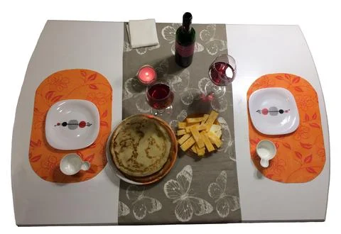 Romantic Dinner Table Setting With Wine, Cheese, Pancakes, Candles And Plat.. Stock Photos