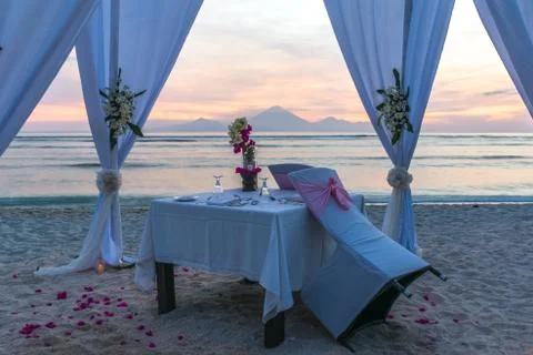Romantic dinner for two on the beach Stock Photos
