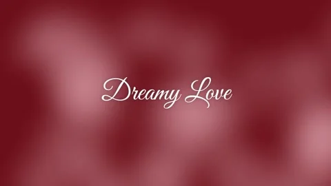 Romantic "Dreamy Love" Script Typography on Soft Red-Pink Gradient Bokeh Ba.. Stock Footage 336805024