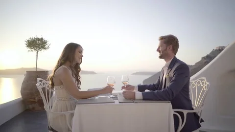 Romantic evening couple table for two terrace sunset Stock Footage 80266774