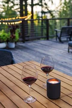 Romantic Evening on a Deck with Wine and Candlelight 스톡 사진