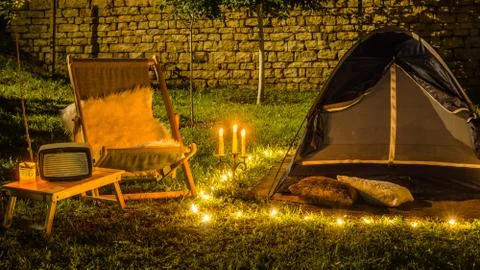 Romantic evening with a tent at night in the yard. Photos