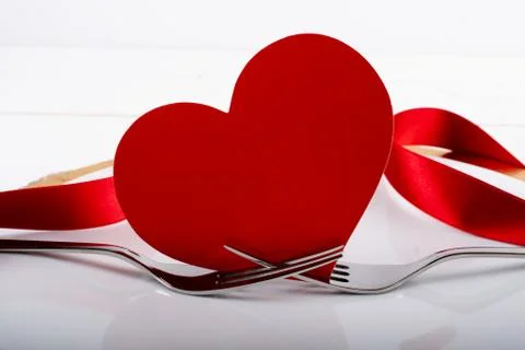 Romantic festive dinner with white empty plate with cutlery Stock Photos