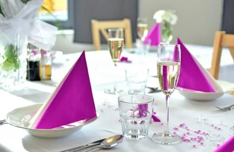 Romantic festive wedding table set in pink color Stock Photos