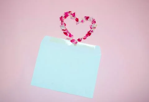 Romantic Flat Lay with Envelope and Petal Heart Stock Photos