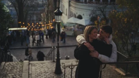 Romantic Getaway Concept Couple Embracing In Paris Cityscape Super 8 Film Style Stock Footage 330093280
