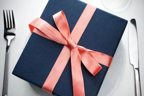 Romantic gift on a plate Stock Photos