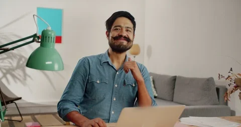 Romantic handsome man dreaming about future smiling in front of display in Stock Footage 120744834