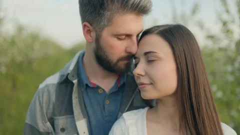 Romantic Hug Between a Couple in Nature Spring Beauty Stock Footage 307796513