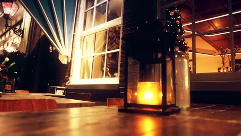Romantic lantern light, lamp with a candle on the table Stock Footage 71296456