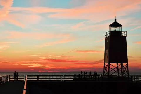 Romantic Lighthouse at Sunset Stock Photos