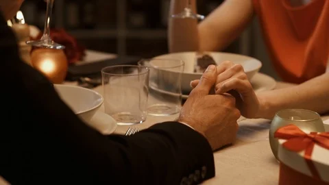 Romantic loving couple having a dinner date and toasting Stock Footage 90073132